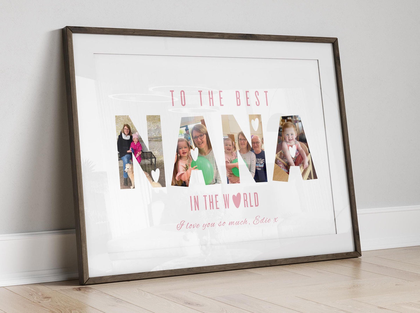A framed personalised print featuring the word &quot;NANA&quot; in large capital letters, with family photos filling each letter. Above, in pink uppercase letters, it reads &quot;TO THE BEST,&quot; and below, &quot;IN THE WORLD&quot; with a heart symbol replacing the letter &quot;O.&quot; At the bottom, in cursive pink text, it says, &quot;I love you so much, Edie x.&quot; The background is white, and the frame is simple and white.