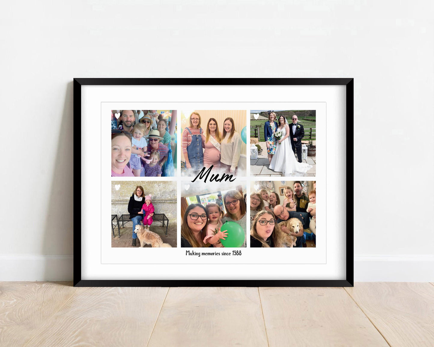 A framed personalized photo collage featuring six family pictures arranged in a grid. The center of the collage has the word &#39;Mummy&#39; written in elegant script, with the phrase &#39;Making memories since 2022&#39; below it. The photos capture various moments, including beach outings, family gatherings, and fun activities with a child. The frame is white, and small heart icons are placed on some of the images, adding a sentimental touch.