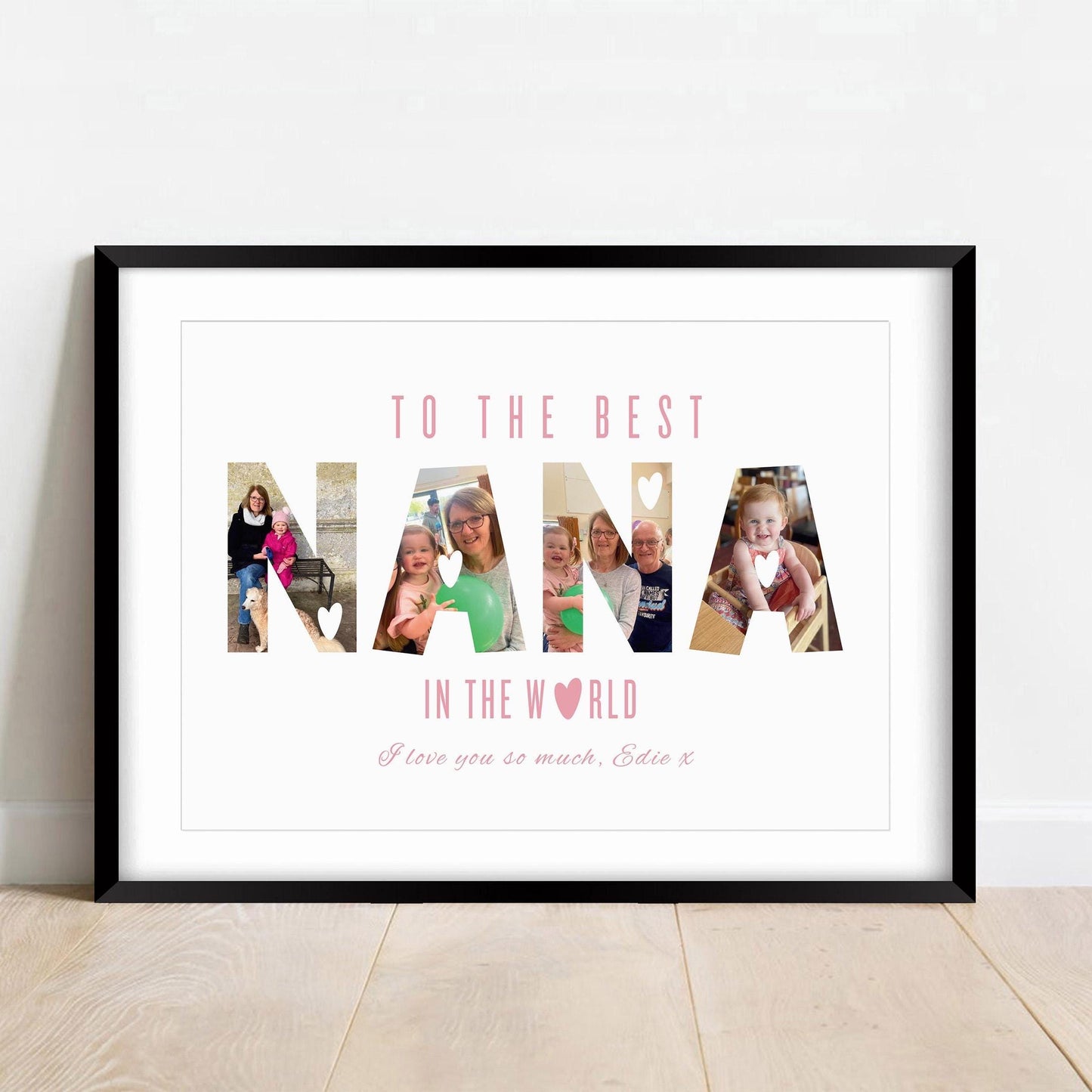 A framed personalised print featuring the word &quot;NANA&quot; in large capital letters, with family photos filling each letter. Above, in pink uppercase letters, it reads &quot;TO THE BEST,&quot; and below, &quot;IN THE WORLD&quot; with a heart symbol replacing the letter &quot;O.&quot; At the bottom, in cursive pink text, it says, &quot;I love you so much, Edie x.&quot; The background is white, and the frame is simple and white.